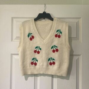 Adorable crop shirt with cherries on top. Great for all seasons.